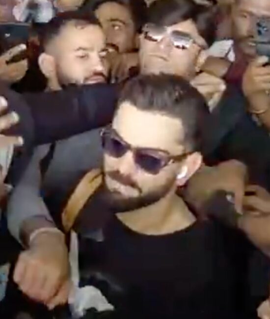 Fans-Mobbed-Virat-Kohli-At-Vadodara-Airport